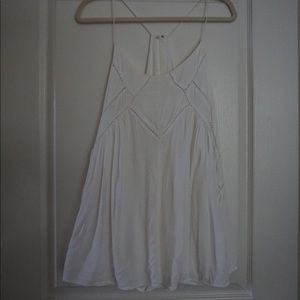 White flowy dress with cute stitch details